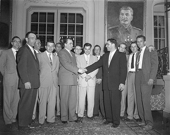 Elbe veterans visit Soviet Ambassador. Soviet Ambassador Georgi Zarubin, left, shakes hands with Murray Schulman of Queens Village, N.Y. as a group of U.S. Army veterans who participated in the Elbe River link-up with Russian troops 10 years ago call on him. April 25, 1955 the Russian Embassy in Washington, D.C. Left to right are: Edwin Jeary, Robert Haag, Byron Shiver, John Adams, Charles Forrester, Zarubin, William Weisel, Yuri Gouk, Soviet second secretary, Elijah Sams, Schulman, Robert Legal, Fred Johnston and Claude Moore (AP Photo/John Rous). Source: AP Images